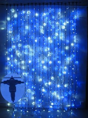 La plus vendue des lampes de rideau de Noël 12V pour les bâtiments